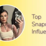 Feature image for 'Top Snapchat Influencers' with a woman in a cream crop top and cross necklace taking a mirror selfie.
